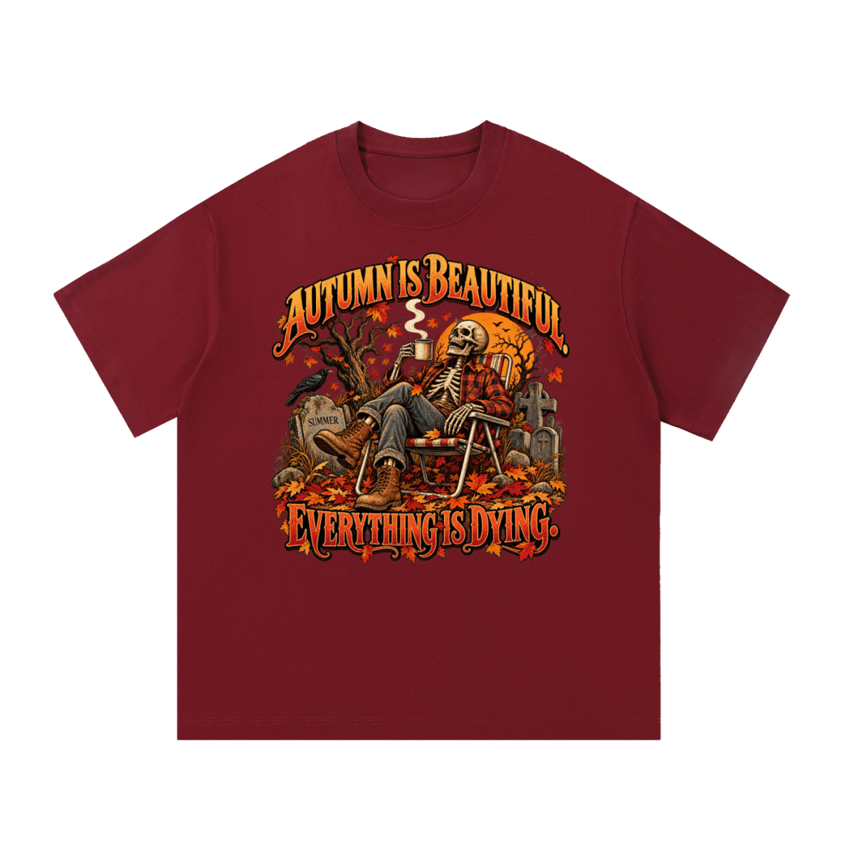 Burgundy Autumn Is Beautiful T-shirt, front view with a seated skeleton, fall leaves and "Everything Is Dying" lettering.