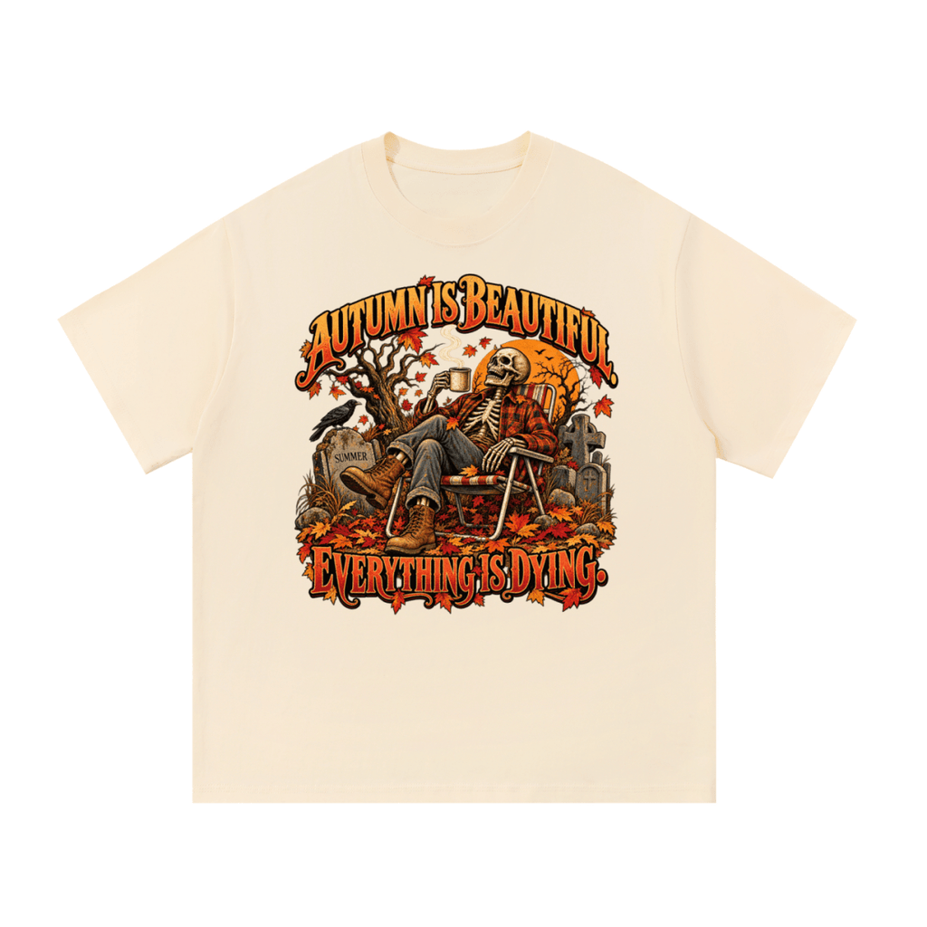 Cream Autumn Is Beautiful T-shirt, front view with a seated skeleton, fall leaves and "Everything Is Dying" lettering.