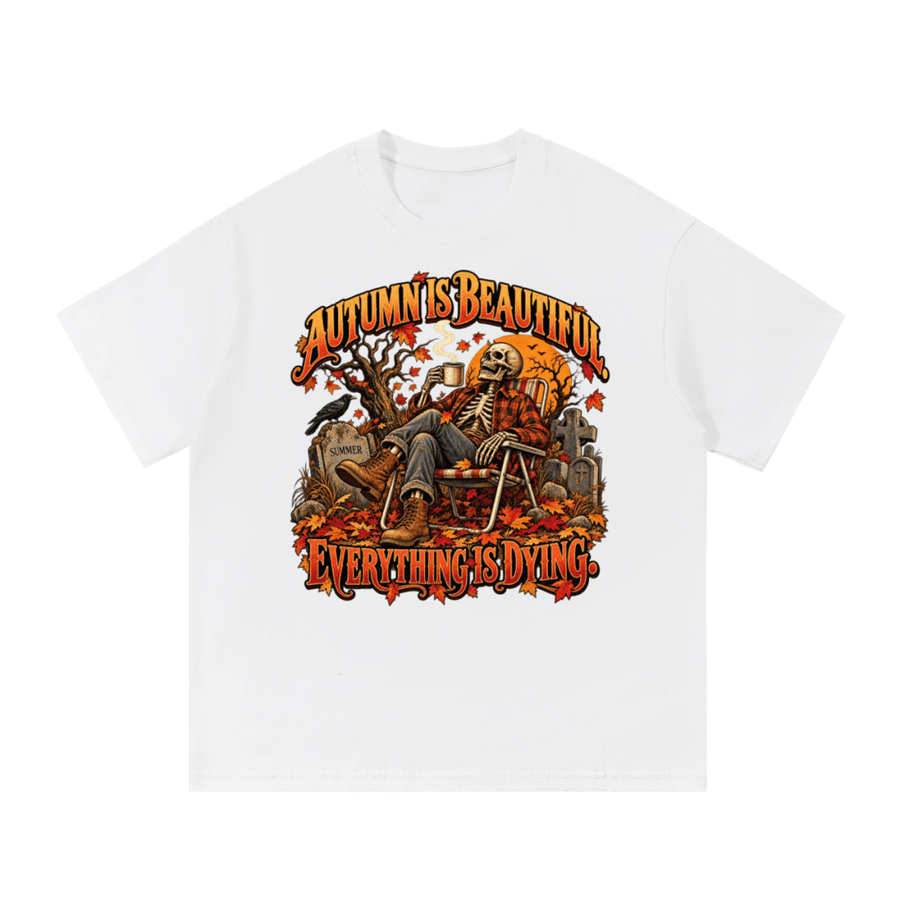 White Autumn Is Beautiful T-shirt, front view with a seated skeleton, fall leaves and "Everything Is Dying" lettering.