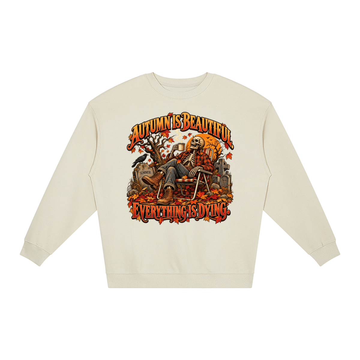 Ivory Autumn Is Beautiful Everything Is Dying loose crewneck sweatshirt, front view with a seated skeleton surrounded by autumn leaves beneath Autumn Is Beautiful Everything Is Dying lettering.