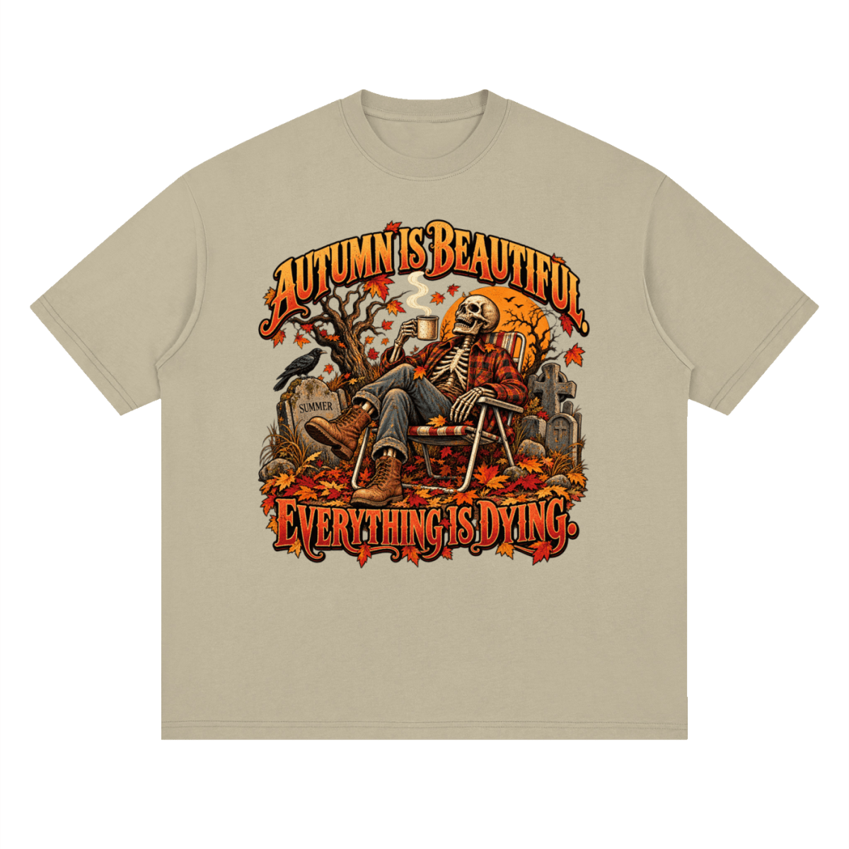 Khaki Autumn Is Beautiful drop-shoulder T-shirt, front view with a seated skeleton, fall leaves and orange lettering.
