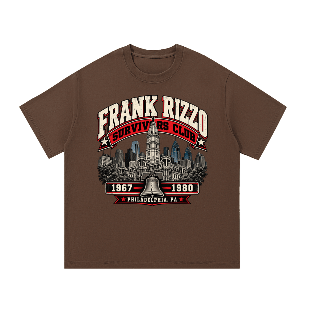 Brown Frank Rizzo Survivors Club T-shirt, front view with a Philadelphia skyline, bell and red and cream Survivors Club lettering.