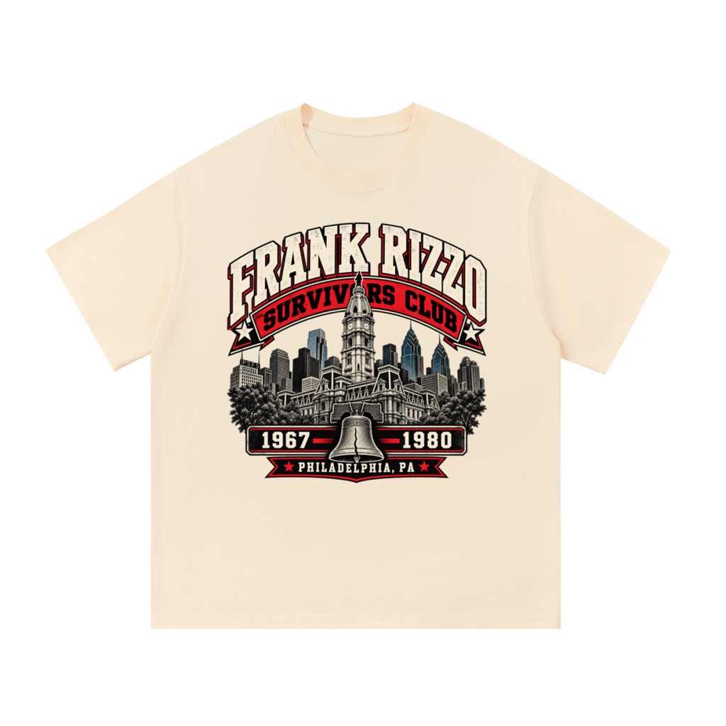 Cream Frank Rizzo Survivors Club T-shirt, front view with a Philadelphia skyline, bell and red and cream Survivors Club lettering.