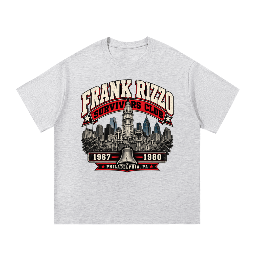 Light gray Frank Rizzo Survivors Club T-shirt, front view with a Philadelphia skyline, bell and red and cream Survivors Club lettering.
