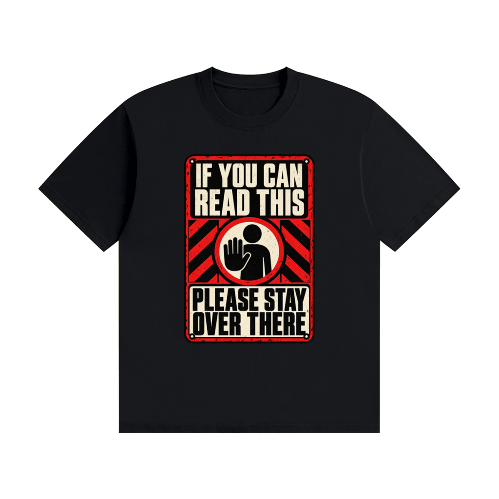 Black cotton T-shirt, front view with a red-and-cream warning sign reading If You Can Read This Please Stay Over There.
