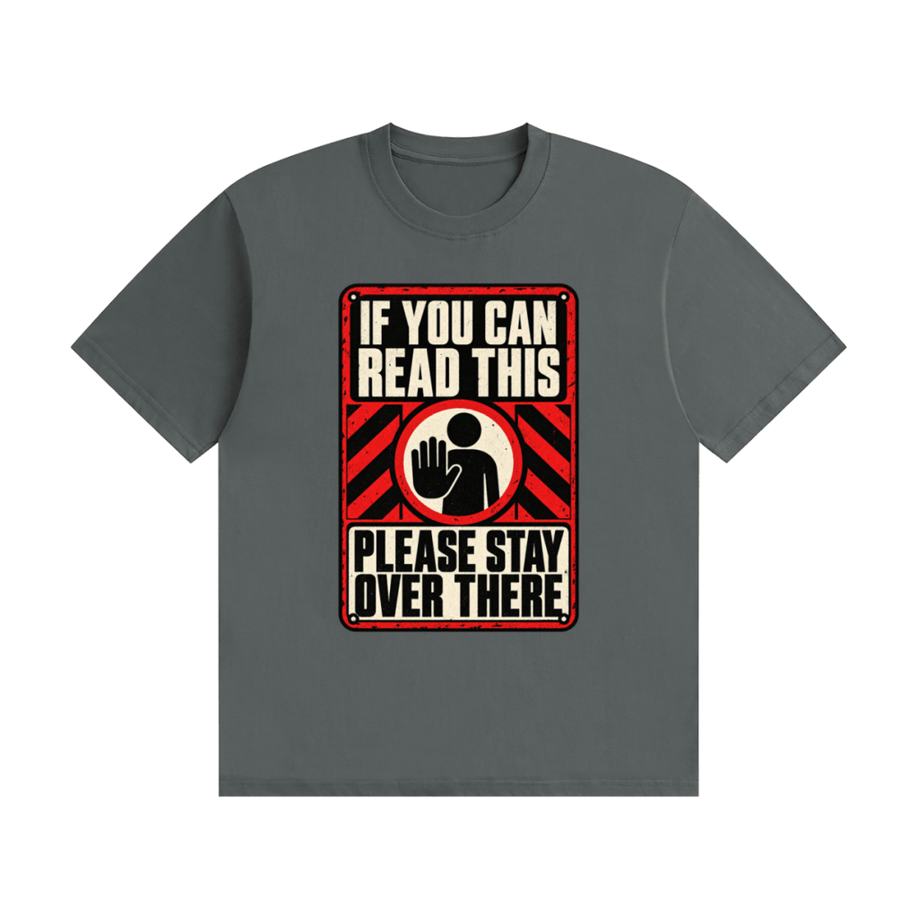 Dark gray cotton T-shirt, front view with a red-and-cream warning sign reading If You Can Read This Please Stay Over There.