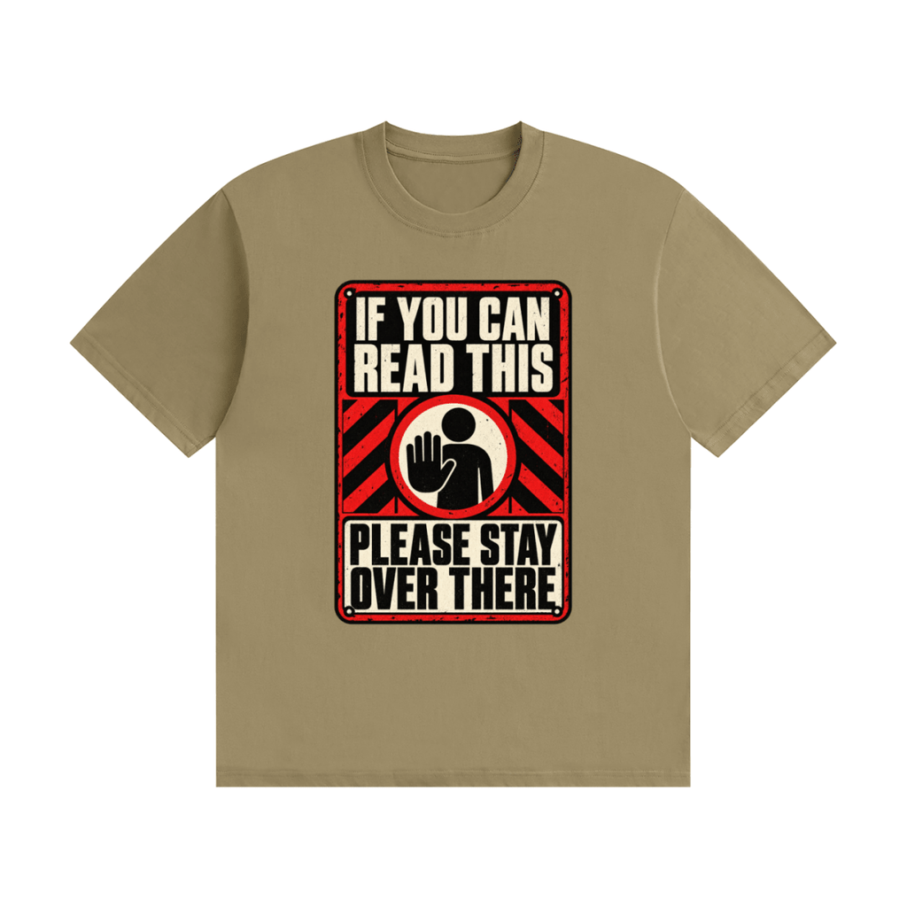 Khaki cotton T-shirt, front view with a red-and-cream warning sign reading If You Can Read This Please Stay Over There.