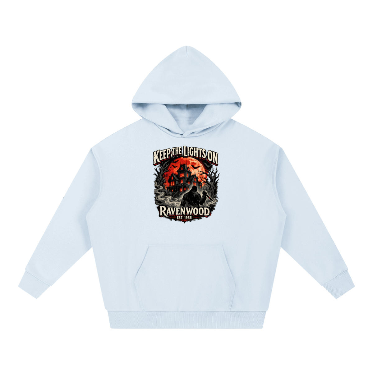 Light blue heavyweight hoodie, front view with a haunted house, orange moon and knife-holding silhouette with Keep the Lights On and Ravenwood Est. 1986 lettering.
