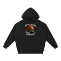 Black heavyweight hoodie, front view with a haunted house, orange moon and knife-holding silhouette with Keep the Lights On and Ravenwood Est. 1986 lettering.