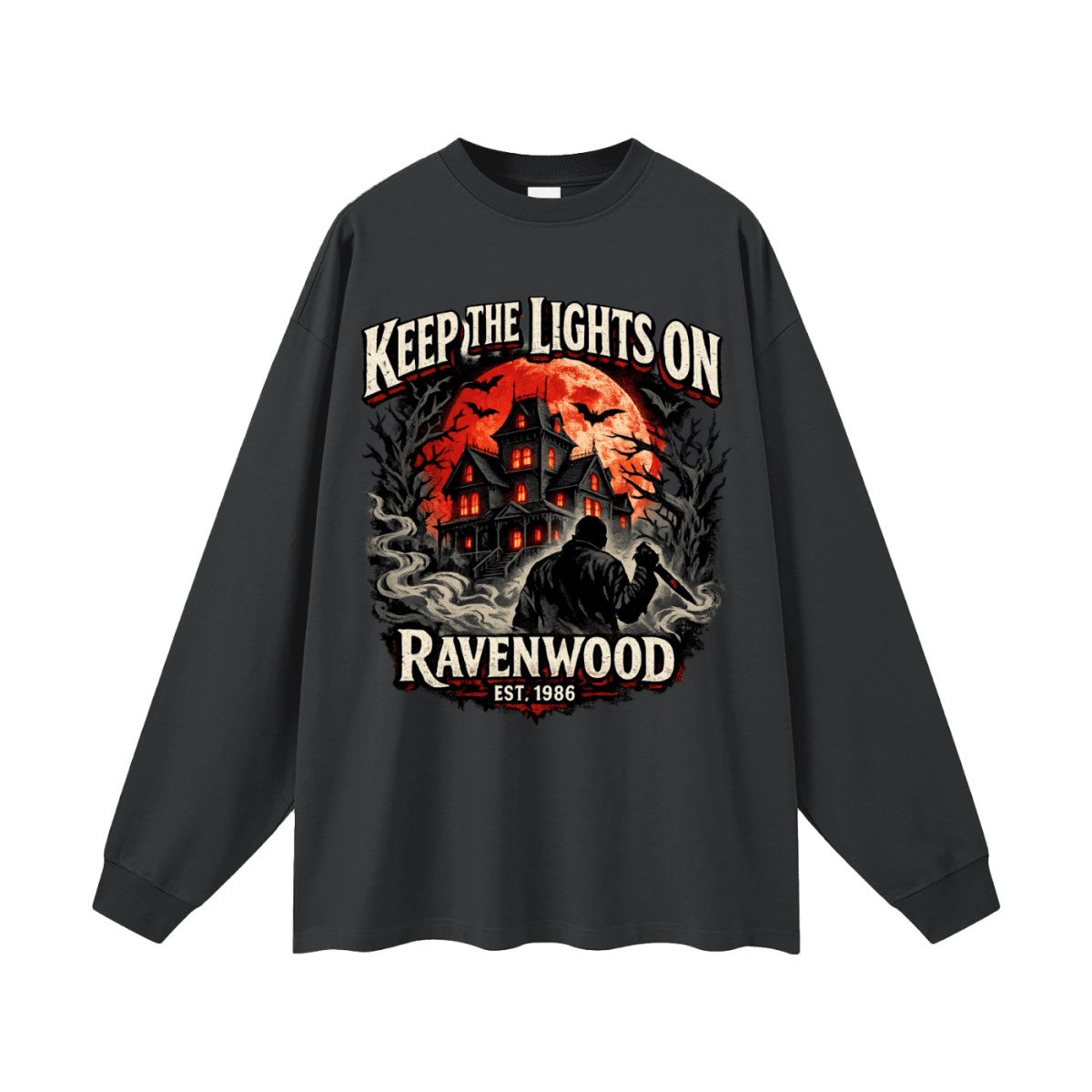 Charcoal oversized long-sleeve T-shirt, front view with a haunted house, orange moon and knife-holding silhouette with Keep the Lights On and Ravenwood Est. 1986 lettering.