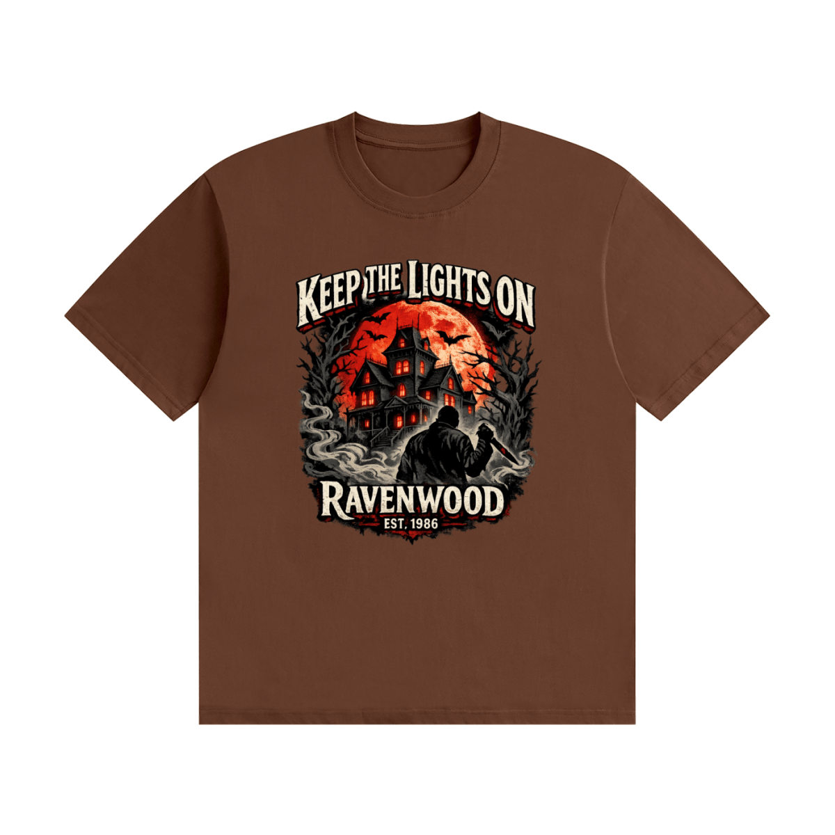 Brown cotton T-shirt, front view with a haunted house, orange moon and knife-holding silhouette with Keep the Lights On and Ravenwood Est. 1986 lettering.