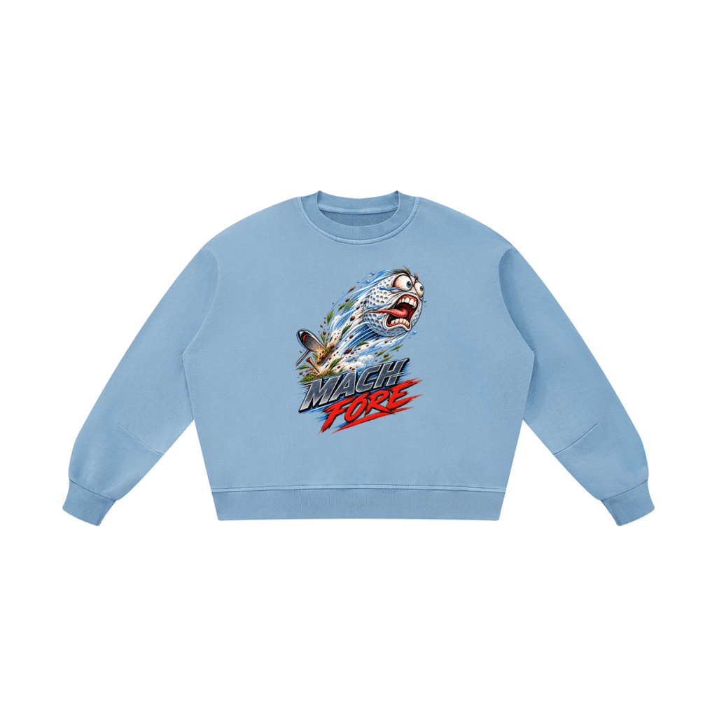 Light blue Mach Fore boxy vintage-washed sweatshirt, front view with a flying cartoon golf ball and silver and red lettering.