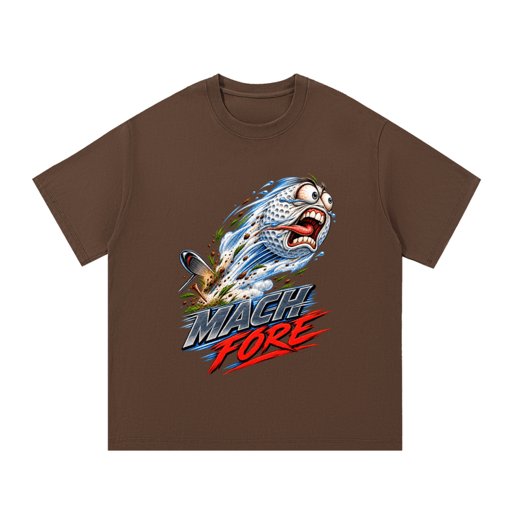 Brown Mach Fore T-shirt, front view with a screaming cartoon golf ball with blue motion streaks and red and gray lettering.