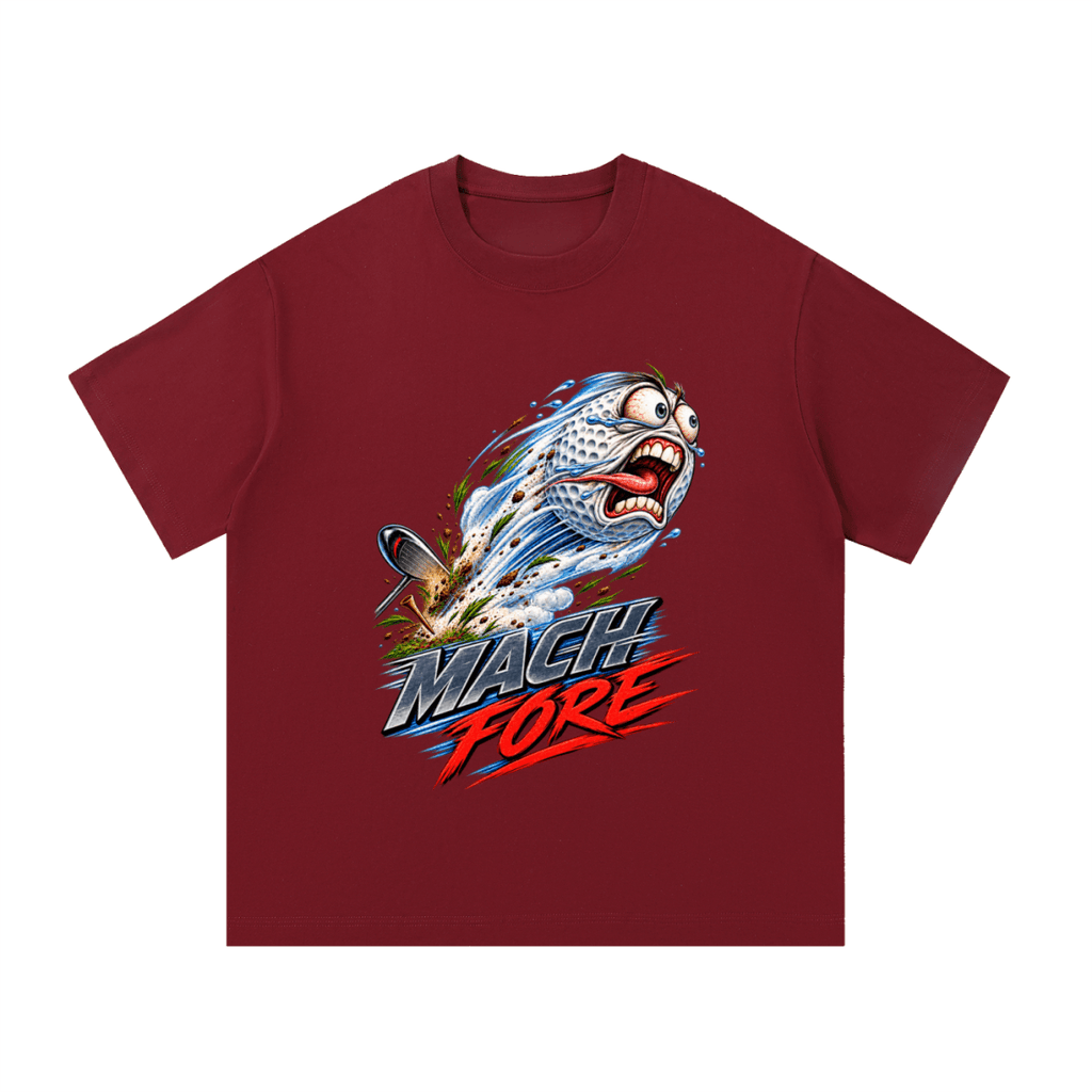 Burgundy Mach Fore T-shirt, front view with a screaming cartoon golf ball with blue motion streaks and red and gray lettering.