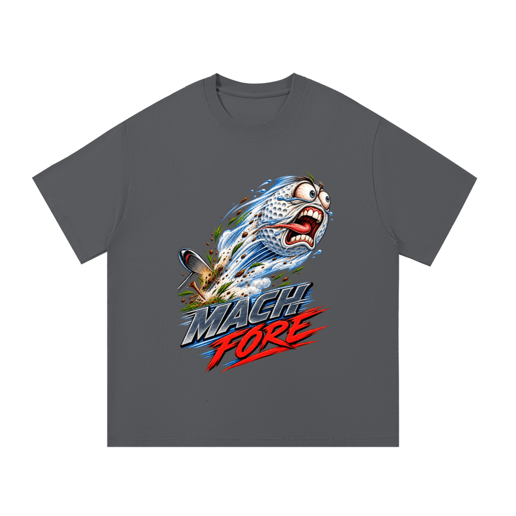 Charcoal gray Mach Fore T-shirt, front view with a screaming cartoon golf ball with blue motion streaks and red and gray lettering.