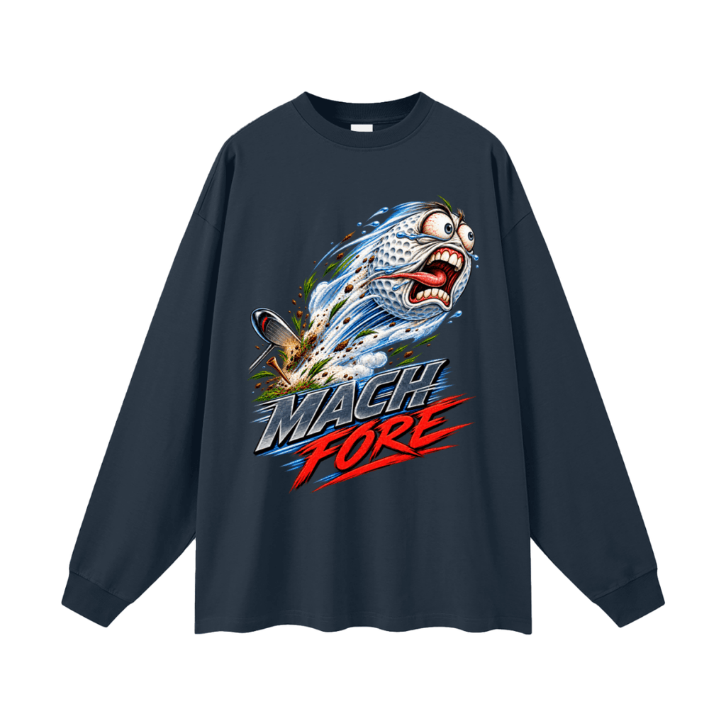 Navy blue Mach Fore long-sleeve T-shirt, front view with a screaming cartoon golf ball with blue motion streaks and red and gray lettering.