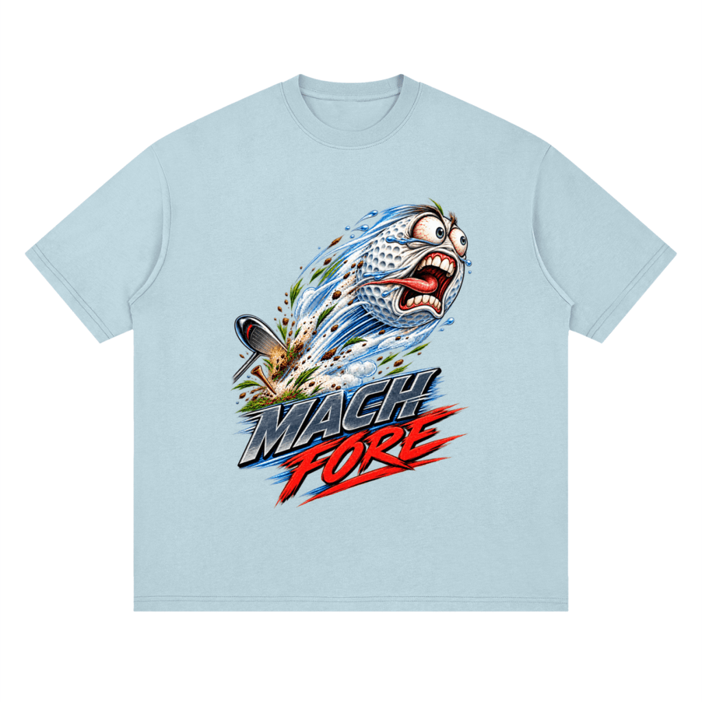 Pale blue Mach Fore drop-shoulder T-shirt, front view with a screaming cartoon golf ball with blue motion streaks and red and gray lettering.