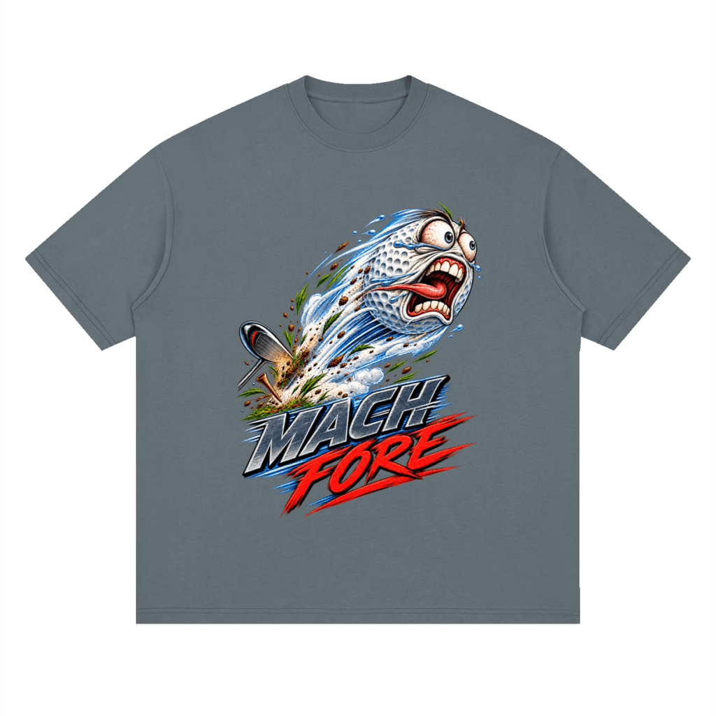 Slate gray Mach Fore drop-shoulder T-shirt, front view with a screaming cartoon golf ball with blue motion streaks and red and gray lettering.