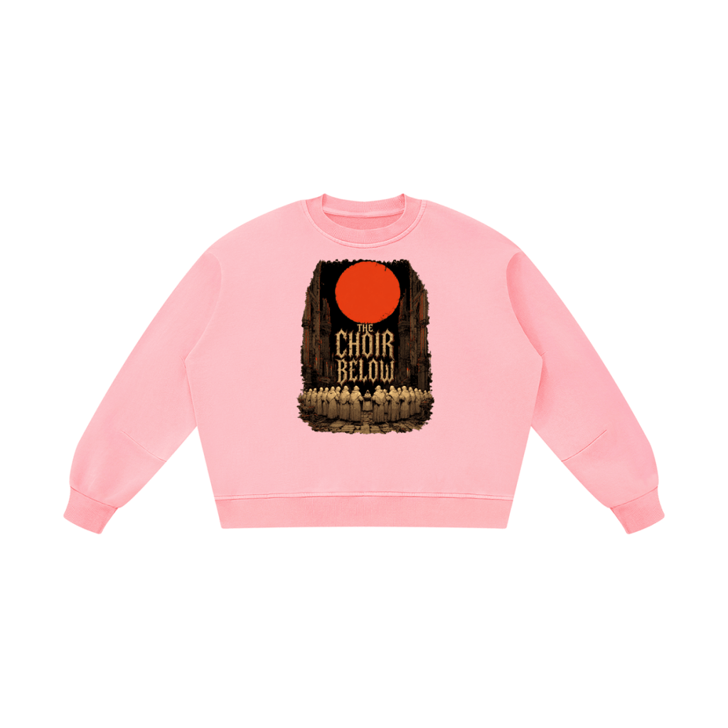 Pink boxy vintage-washed sweatshirt, front view with hooded figures beneath a red moon and The Choir Below lettering.