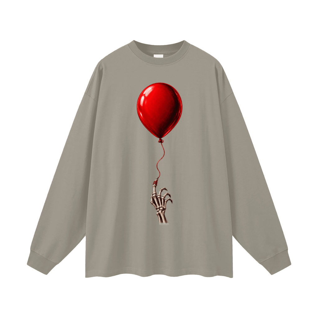 Taupe gray The Last Balloon oversized long sleeve T-shirt, front view with a shiny red balloon tethered to a skeletal hand.