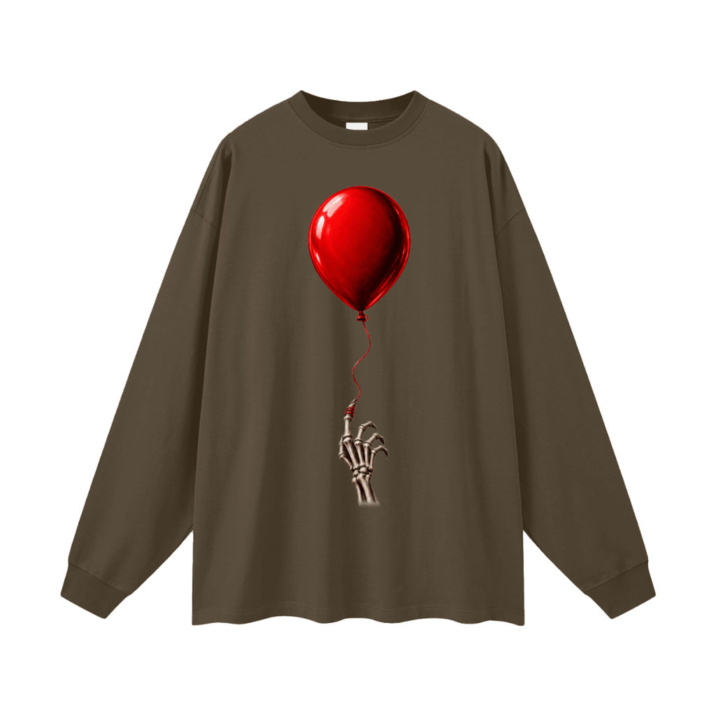 Dark brown The Last Balloon oversized long sleeve T-shirt, front view with a shiny red balloon tethered to a skeletal hand.