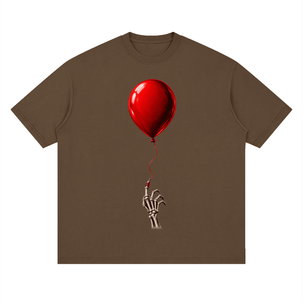 Brown The Last Balloon drop shoulder T-shirt, front view with a shiny red balloon tethered to a skeletal hand.