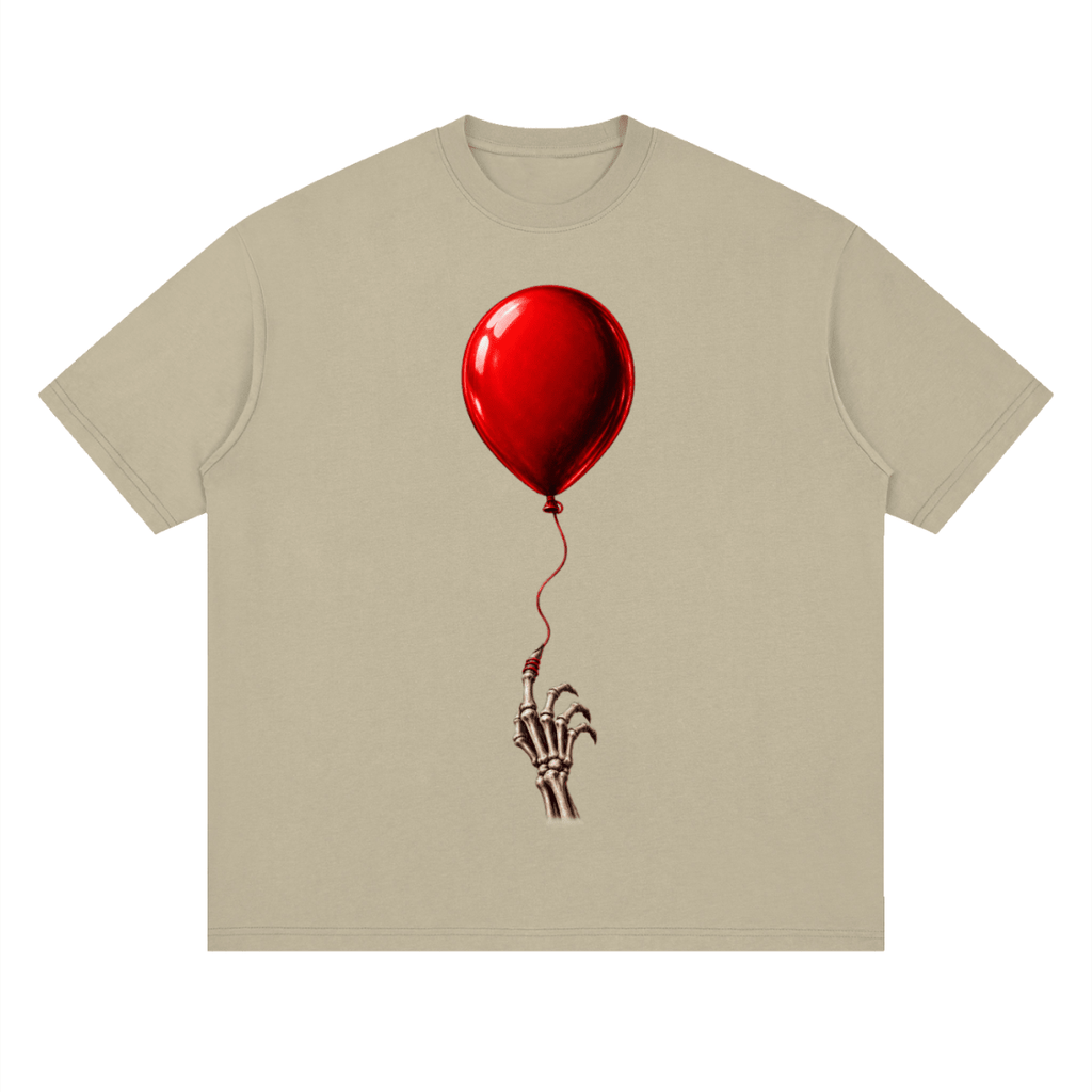 Khaki The Last Balloon drop shoulder T-shirt, front view with a shiny red balloon tethered to a skeletal hand.