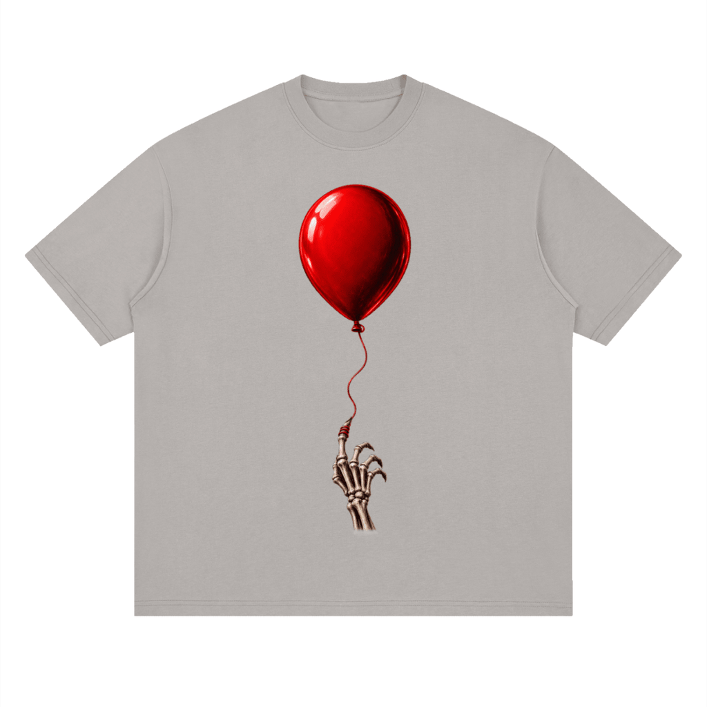Light gray The Last Balloon drop shoulder T-shirt, front view with a shiny red balloon tethered to a skeletal hand.