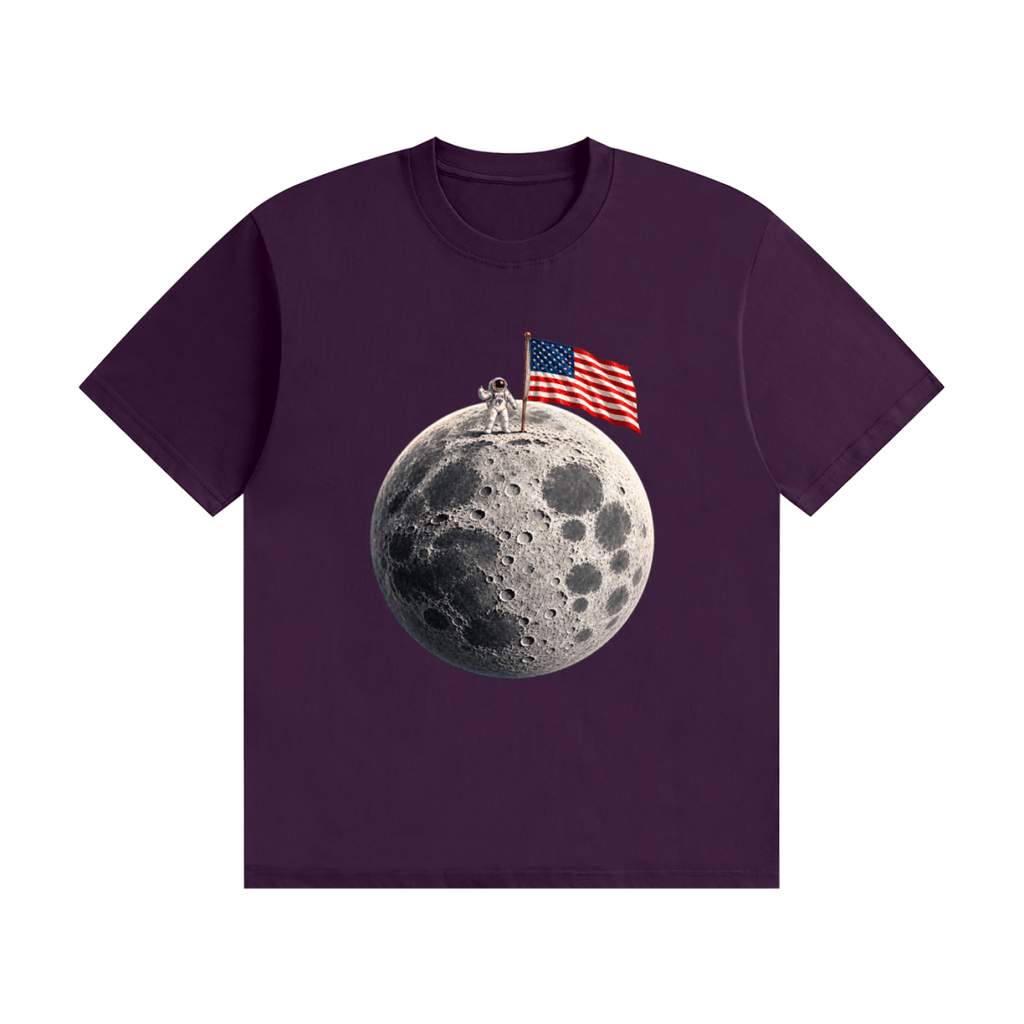 Purple cotton T-shirt, front view with an astronaut and American flag on a cratered moon.