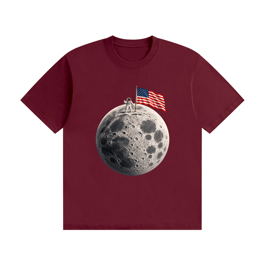 Burgundy cotton T-shirt, front view with an astronaut and American flag on a cratered moon.